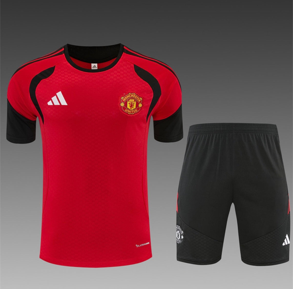 Ensemble Maillot + Short Manchester United Entraînement Rouge/Noir 2026/27